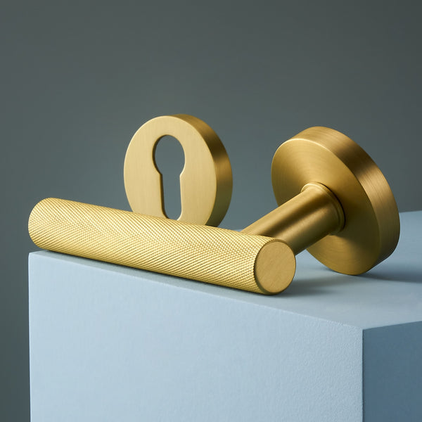 Door handle 308A-242 | Knurled | Brass